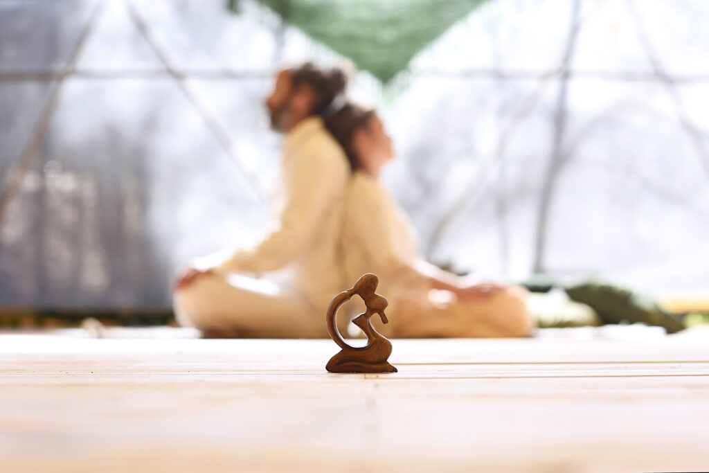 Man,And,Woman,Couple,Practicing,Yoga,Seated,And,Leaning,On